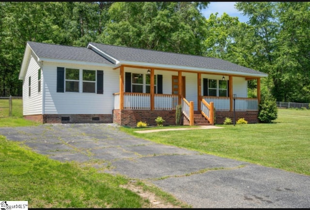 single story home featuring a porch, crawl space, a front yard, roof with shingles, and fence