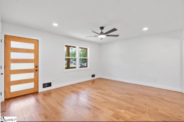 entryway with ceiling fan, visible vents, baseboards, light wood-style floors, and recessed lighting