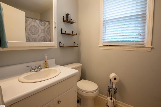 full bath with vanity and toilet