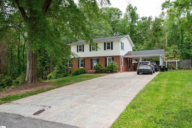 view of front of home featuring an attached carport, aphalt driveway, a front lawn, and brick siding