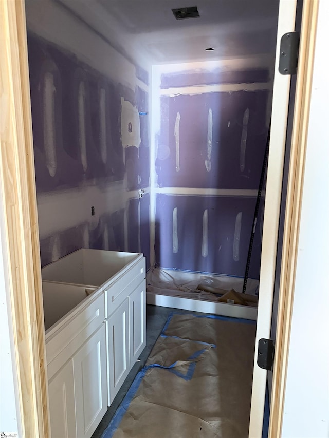 397 Wynette Way, Inman, SC 29349 - kitchen featuring white cabinetry and concrete floors
