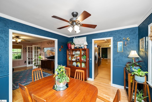 2 Finley Ct, Mauldin, SC 29662 - dining room with crown molding, ceiling fan, baseboards, and wood finished floors
