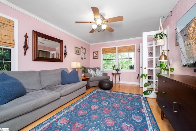 2 Finley Ct, Mauldin, SC 29662 - living area featuring baseboards, ceiling fan, ornamental molding, and light wood-style flooring