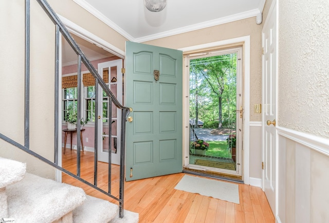 2 Finley Ct, Mauldin, SC 29662 - foyer featuring ornamental molding, stairs, light wood finished floors, and wainscoting