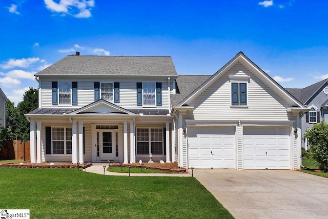 view of front of house with a front lawn, a shingled roof, concrete driveway, an attached garage, and a porch