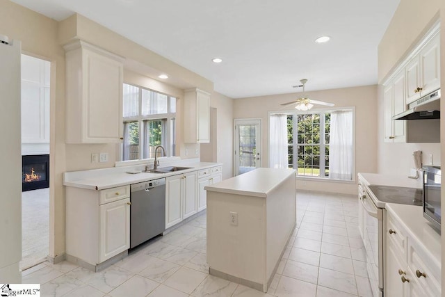 kitchen with a sink, a center island, stainless steel dishwasher, under cabinet range hood, and white electric stove