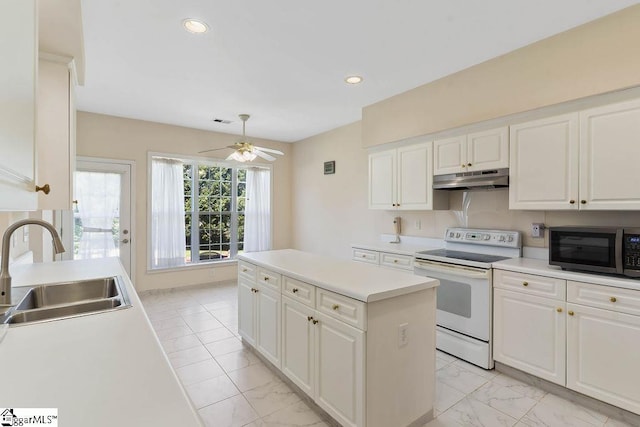 kitchen featuring a sink, stainless steel microwave, marble finish floor, white range with electric stovetop, and under cabinet range hood
