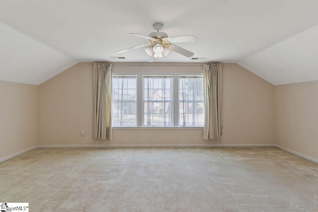 bonus room with carpet floors, ceiling fan, visible vents, and lofted ceiling