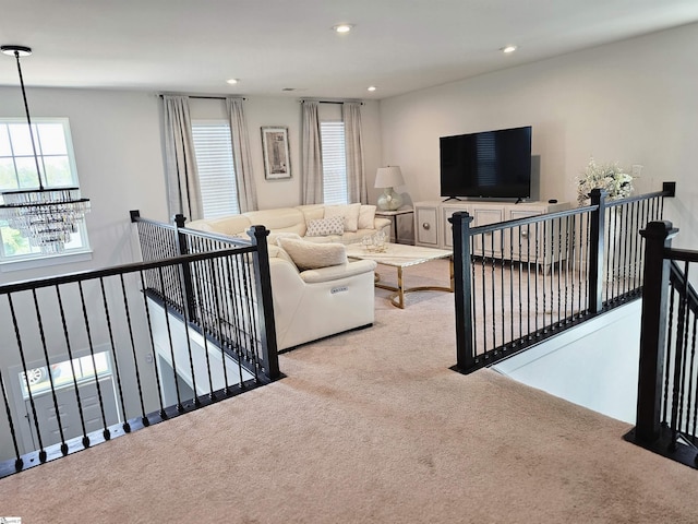 carpeted living room with recessed lighting
