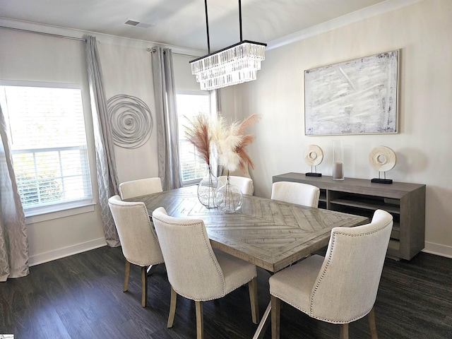 dining room featuring baseboards, a notable chandelier, dark wood-style floors, and visible vents