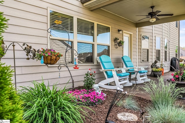 view of patio / terrace with a porch and a ceiling fan