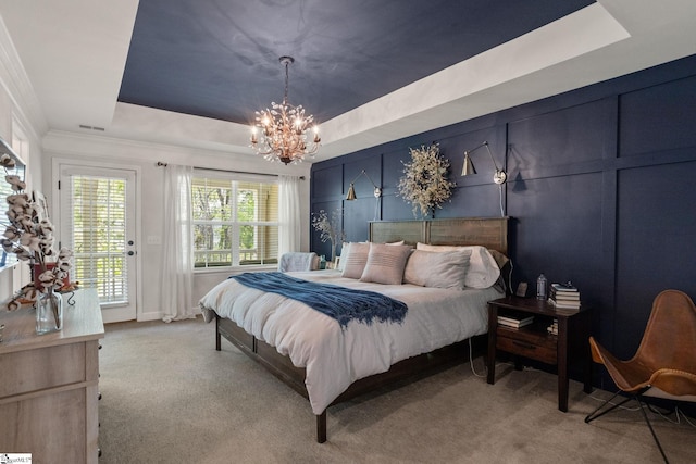bedroom with access to outside, light colored carpet, a notable chandelier, a raised ceiling, and baseboards