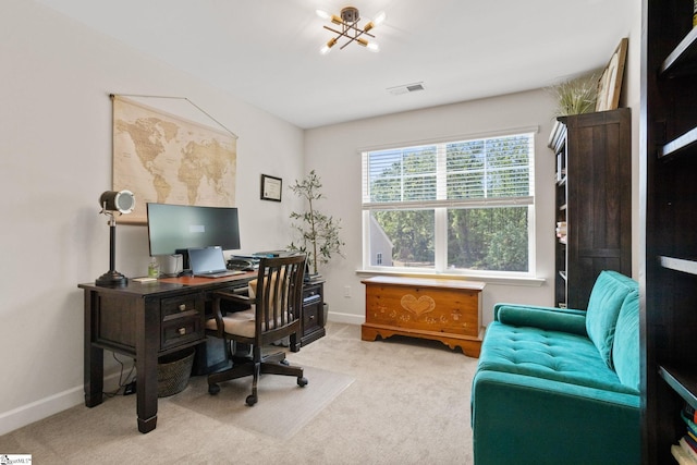 office space with baseboards, carpet, a notable chandelier, and visible vents