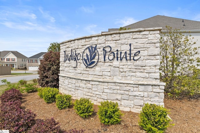 view of community sign