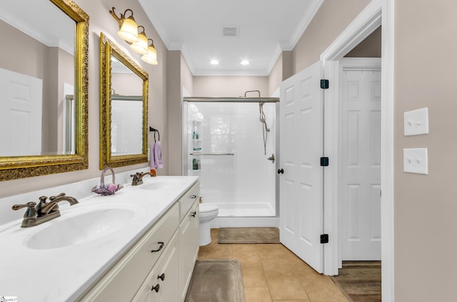 bathroom with crown molding, double vanity, a shower stall, and a sink