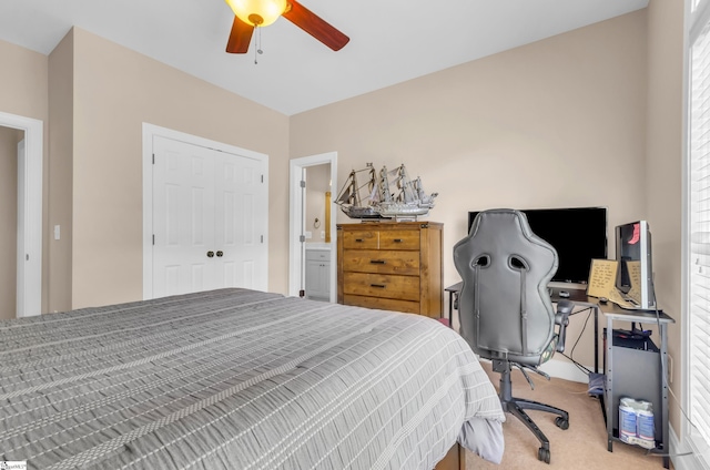 bedroom with light carpet and a ceiling fan