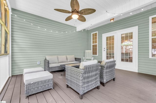 deck featuring an outdoor hangout area and ceiling fan