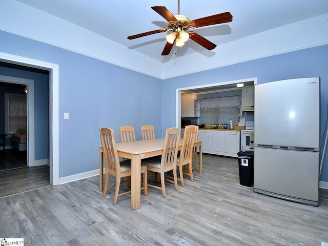 215 Louisiana St, Honea Path, SC 29654 - dining space with baseboards, ceiling fan, and light wood finished floors