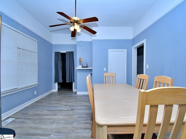 215 Louisiana St, Honea Path, SC 29654 - dining space with baseboards, ceiling fan, and wood finished floors
