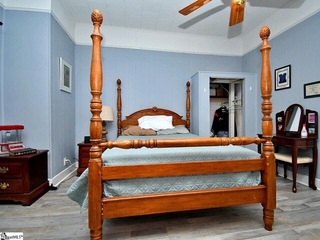 215 Louisiana St, Honea Path, SC 29654 - bedroom with crown molding, ceiling fan, and wood finished floors