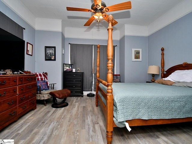 215 Louisiana St, Honea Path, SC 29654 - bedroom with ornamental molding, a ceiling fan, and wood finished floors