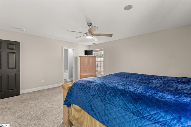 bedroom featuring baseboards, ceiling fan, and carpet