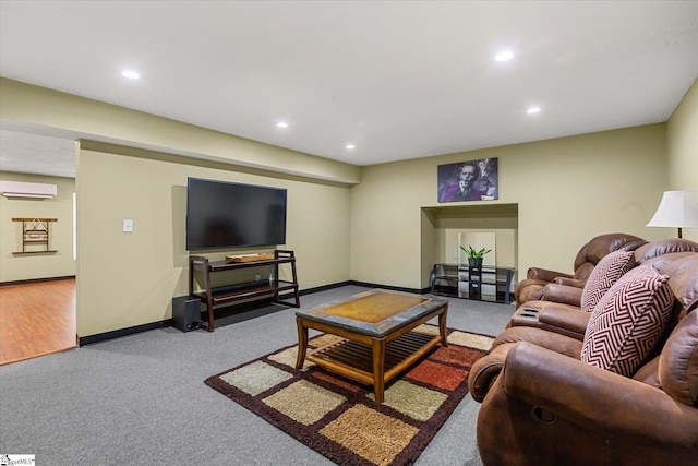 living room with recessed lighting, baseboards, a wall mounted AC, and carpet