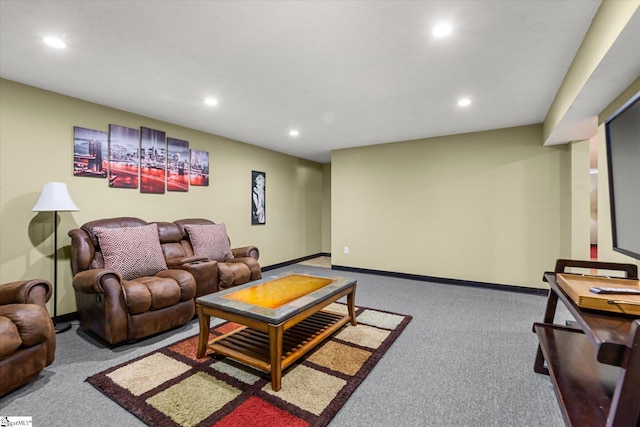 carpeted living room featuring baseboards and recessed lighting