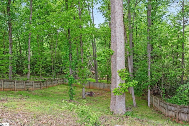 view of yard with fence