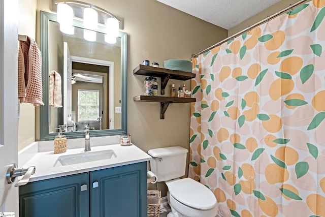bathroom with vanity, a textured ceiling, toilet, and a shower with curtain