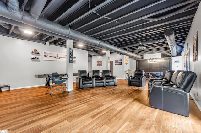 interior space featuring baseboards and wood finished floors
