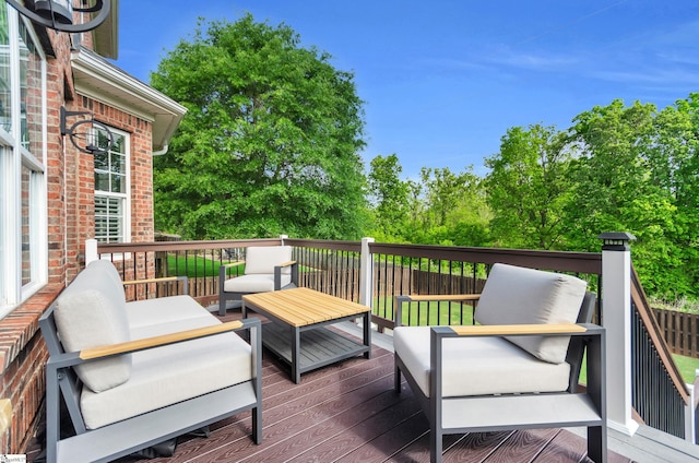 wooden terrace featuring an outdoor living space