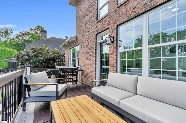 deck with an outdoor hangout area