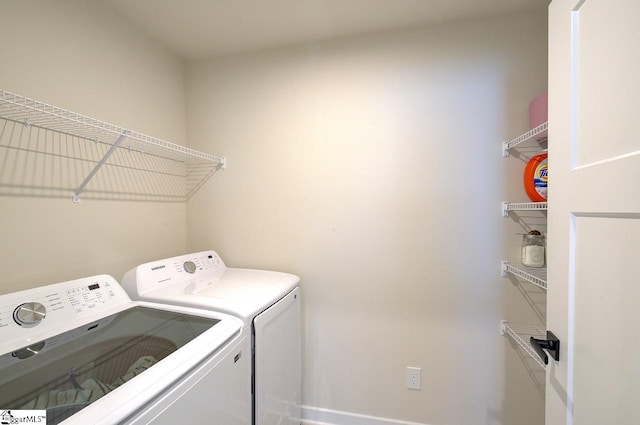 38 Comanche Trl, Greenville, SC 29607 - washroom featuring laundry area, baseboards, and washing machine and dryer