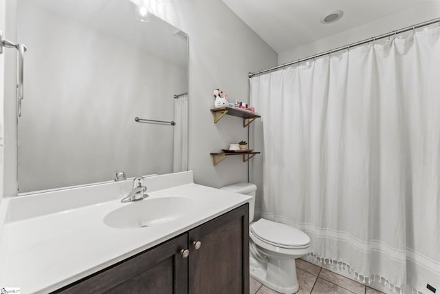 bathroom with vanity, tile patterned flooring, toilet, and visible vents
