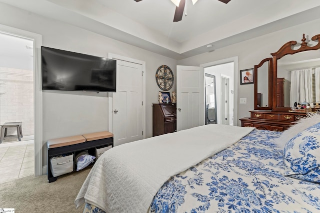 carpeted bedroom featuring a ceiling fan