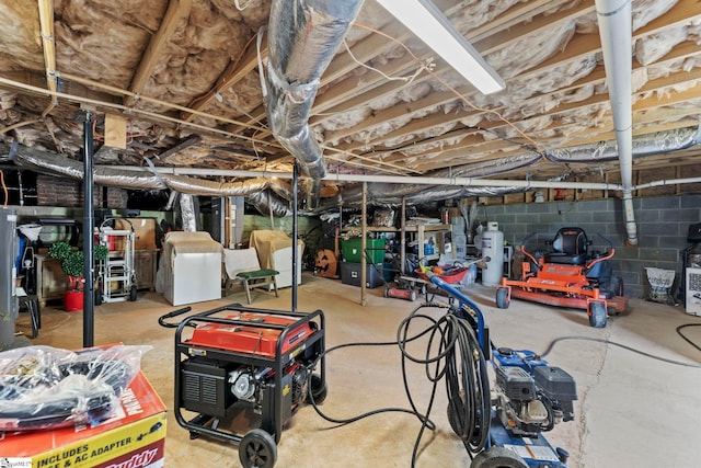 unfinished below grade area with washer / clothes dryer
