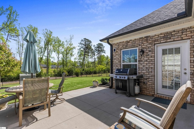 305 Fox Brook Ct, Taylors, SC 29687 - view of patio featuring a fenced backyard, outdoor dining area, and area for grilling