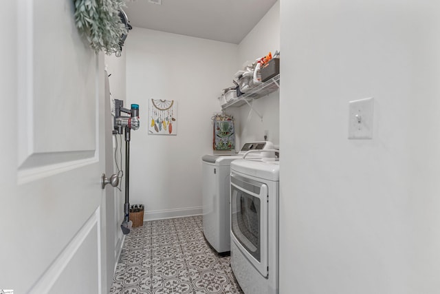 305 Fox Brook Ct, Taylors, SC 29687 - laundry area featuring light floors, baseboards, laundry area, and independent washer and dryer