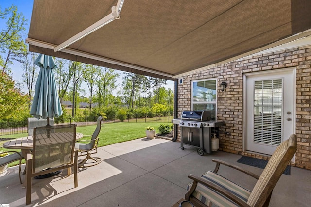 305 Fox Brook Ct, Taylors, SC 29687 - view of patio featuring a fenced backyard and outdoor dining space
