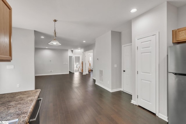kitchen with recessed lighting, appliances with stainless steel finishes, dark wood finished floors, and visible vents