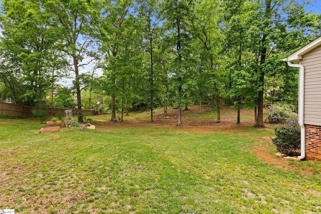 view of yard with fence
