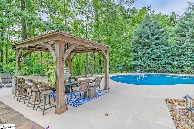 268 Antrim Ave, Moore, SC 29369 - view of swimming pool featuring a patio area, outdoor dry bar, a gazebo, fence, and a fenced in pool