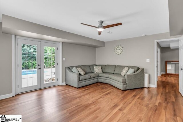 268 Antrim Ave, Moore, SC 29369 - living room featuring baseboards, ceiling fan, french doors, and light wood finished floors