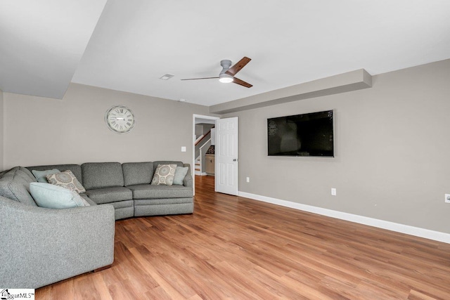 268 Antrim Ave, Moore, SC 29369 - living area featuring ceiling fan, light wood finished floors, stairs, baseboards, and visible vents