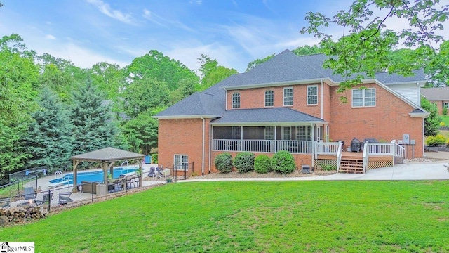 268 Antrim Ave, Moore, SC 29369 - back of property with a gazebo, brick siding, fence, and a deck