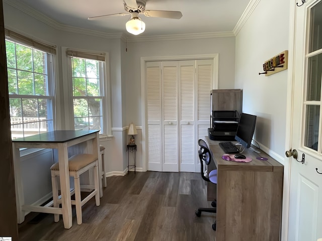 office space with baseboards, ornamental molding, a ceiling fan, and dark wood-type flooring