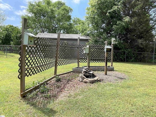 view of yard with fence