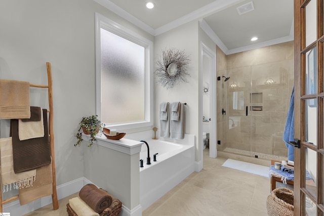bathroom with visible vents, a garden tub, crown molding, toilet, and a stall shower