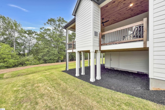 view of yard with a balcony